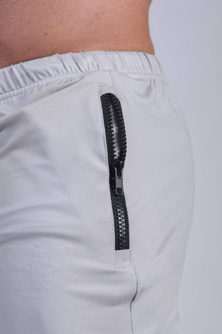 Pantalones cortos de culturismo Agile de 4'' con bolsillos con cremallera - Gris platino